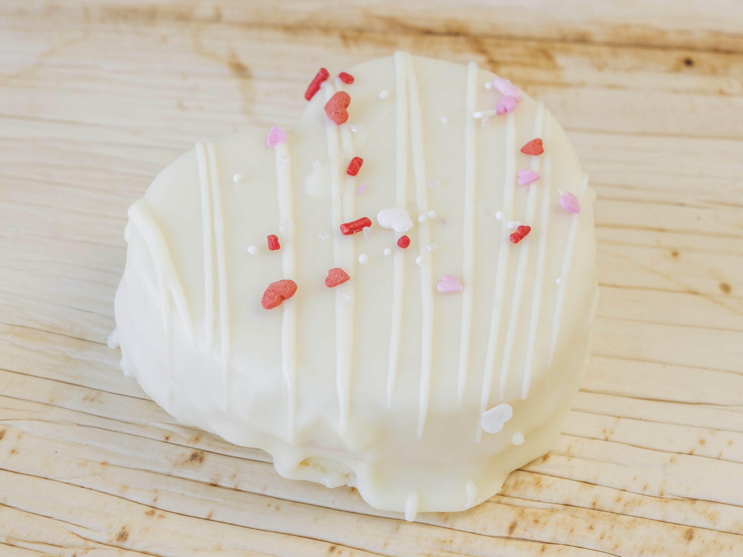 STRAWBERRY FILLED VANILLA PROTEIN HEART CAKE